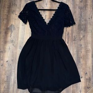 Black mystic lace dress with a low v